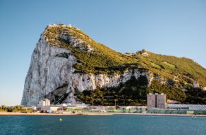 The Rock of Gilbraltar is a 1,400 foot high monolith that sits at the northern end of the strait that separates the Atlantic Ocean from the Mediterranean Sea.