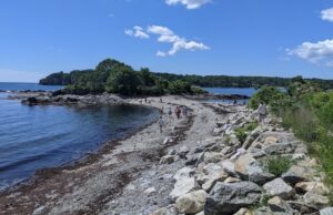 A small isthmus that leads to a piece of land on Peak's Island, Maine.