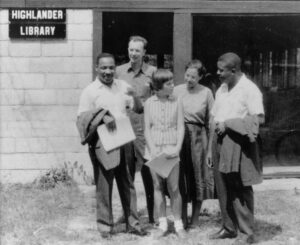 Dr. Martin Luther King, Pete Seeger, Rosa Parks and Ralph Abernathy at the 25th anniversary of the Highlander Folk School in 1957
