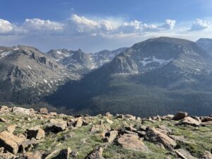 A canyon called Forest Canyon with Rocky Mountains in the background.